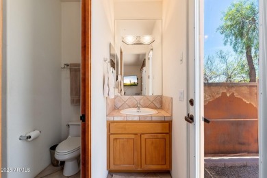Experience desert living in this stunning 4-bedroom home located on Troon North Golf Club  in Arizona - for sale on GolfHomes.com, golf home, golf lot