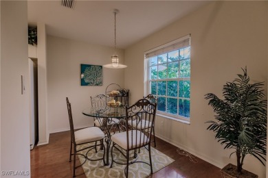 Discover the perfect TURNKEY condo with breathtaking water views on Estero Country Club in Florida - for sale on GolfHomes.com, golf home, golf lot