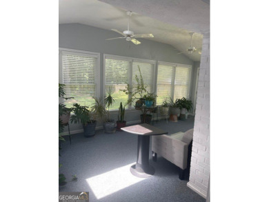 This ranch home is happily situated on a beautiful 1.03-acre lot on Honey Creek Country Club in Georgia - for sale on GolfHomes.com, golf home, golf lot