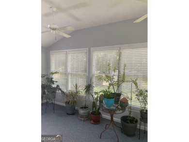 This ranch home is happily situated on a beautiful 1.03-acre lot on Honey Creek Country Club in Georgia - for sale on GolfHomes.com, golf home, golf lot