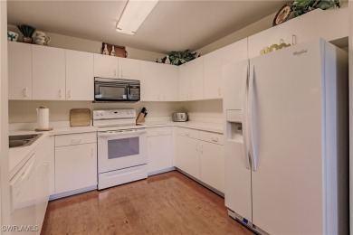Discover the perfect TURNKEY condo with breathtaking water views on Estero Country Club in Florida - for sale on GolfHomes.com, golf home, golf lot