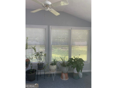 This ranch home is happily situated on a beautiful 1.03-acre lot on Honey Creek Country Club in Georgia - for sale on GolfHomes.com, golf home, golf lot