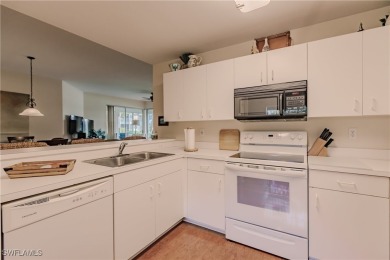Discover the perfect TURNKEY condo with breathtaking water views on Estero Country Club in Florida - for sale on GolfHomes.com, golf home, golf lot