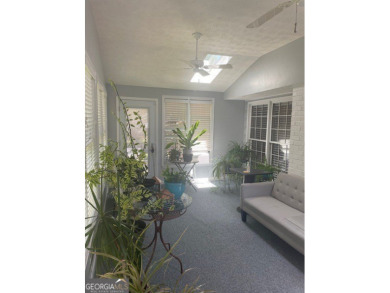 This ranch home is happily situated on a beautiful 1.03-acre lot on Honey Creek Country Club in Georgia - for sale on GolfHomes.com, golf home, golf lot