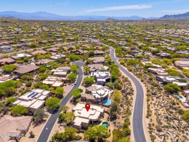 Experience desert living in this stunning 4-bedroom home located on Troon North Golf Club  in Arizona - for sale on GolfHomes.com, golf home, golf lot