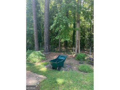 This ranch home is happily situated on a beautiful 1.03-acre lot on Honey Creek Country Club in Georgia - for sale on GolfHomes.com, golf home, golf lot