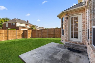 Welcome to this spacious two-story home offering 5 bedrooms, 4 on Hackberry Creek Country Club in Texas - for sale on GolfHomes.com, golf home, golf lot