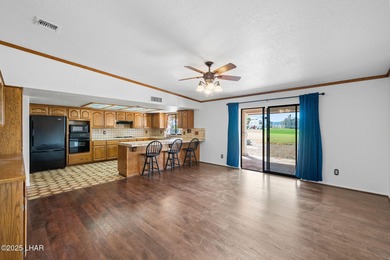 Welcome to this inviting single-family home situated along the on London Bridge Golf Course in Arizona - for sale on GolfHomes.com, golf home, golf lot