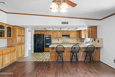 Welcome to this inviting single-family home situated along the on London Bridge Golf Course in Arizona - for sale on GolfHomes.com, golf home, golf lot