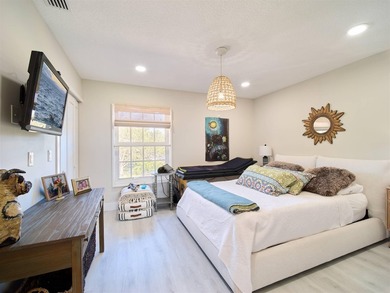 GREENS FEES INCLUDED when you own this SUPER STUNNING FURNISHED on Riverbend Golf Club in Florida - for sale on GolfHomes.com, golf home, golf lot