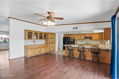 Welcome to this inviting single-family home situated along the on London Bridge Golf Course in Arizona - for sale on GolfHomes.com, golf home, golf lot