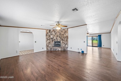 Welcome to this inviting single-family home situated along the on London Bridge Golf Course in Arizona - for sale on GolfHomes.com, golf home, golf lot