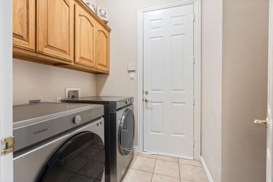 Welcome to this spacious two-story home offering 5 bedrooms, 4 on Hackberry Creek Country Club in Texas - for sale on GolfHomes.com, golf home, golf lot