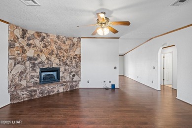 Welcome to this inviting single-family home situated along the on London Bridge Golf Course in Arizona - for sale on GolfHomes.com, golf home, golf lot