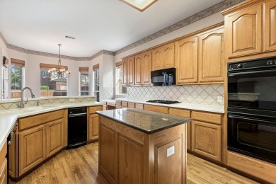 Welcome to this spacious two-story home offering 5 bedrooms, 4 on Hackberry Creek Country Club in Texas - for sale on GolfHomes.com, golf home, golf lot
