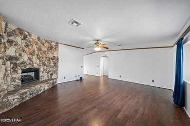 Welcome to this inviting single-family home situated along the on London Bridge Golf Course in Arizona - for sale on GolfHomes.com, golf home, golf lot