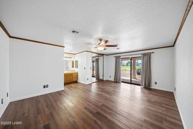 Welcome to this inviting single-family home situated along the on London Bridge Golf Course in Arizona - for sale on GolfHomes.com, golf home, golf lot