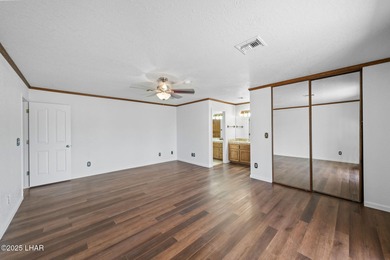 Welcome to this inviting single-family home situated along the on London Bridge Golf Course in Arizona - for sale on GolfHomes.com, golf home, golf lot