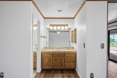 Welcome to this inviting single-family home situated along the on London Bridge Golf Course in Arizona - for sale on GolfHomes.com, golf home, golf lot