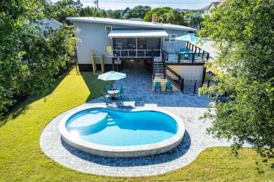 415 Sundial Drive | South Litchfield Beach  Just steps from the on Pawleys Plantation Golf and Country Club in South Carolina - for sale on GolfHomes.com, golf home, golf lot
