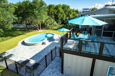 415 Sundial Drive | South Litchfield Beach  Just steps from the on Pawleys Plantation Golf and Country Club in South Carolina - for sale on GolfHomes.com, golf home, golf lot