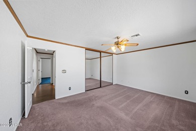 Welcome to this inviting single-family home situated along the on London Bridge Golf Course in Arizona - for sale on GolfHomes.com, golf home, golf lot