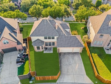 Welcome to this spacious two-story home offering 5 bedrooms, 4 on Hackberry Creek Country Club in Texas - for sale on GolfHomes.com, golf home, golf lot