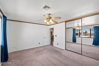 Welcome to this inviting single-family home situated along the on London Bridge Golf Course in Arizona - for sale on GolfHomes.com, golf home, golf lot