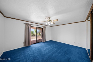 Welcome to this inviting single-family home situated along the on London Bridge Golf Course in Arizona - for sale on GolfHomes.com, golf home, golf lot