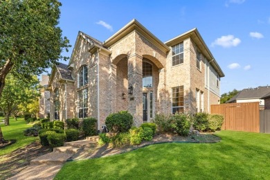 Welcome to this spacious two-story home offering 5 bedrooms, 4 on Hackberry Creek Country Club in Texas - for sale on GolfHomes.com, golf home, golf lot