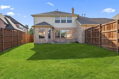 Welcome to this spacious two-story home offering 5 bedrooms, 4 on Hackberry Creek Country Club in Texas - for sale on GolfHomes.com, golf home, golf lot