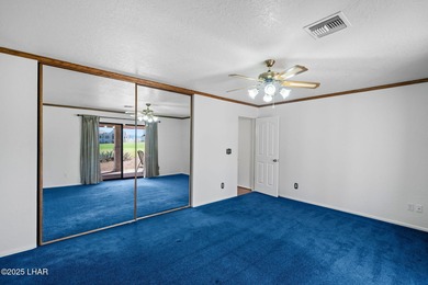 Welcome to this inviting single-family home situated along the on London Bridge Golf Course in Arizona - for sale on GolfHomes.com, golf home, golf lot