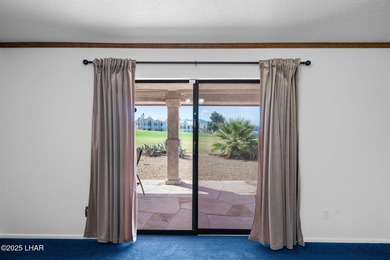 Welcome to this inviting single-family home situated along the on London Bridge Golf Course in Arizona - for sale on GolfHomes.com, golf home, golf lot