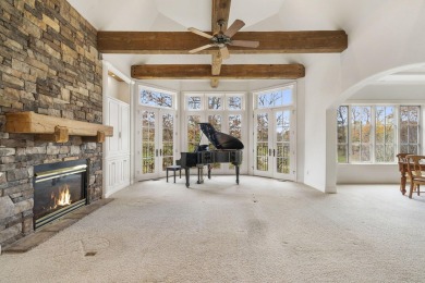 Welcome to this extraordinary 5-bedroom, 4.5-bath sanctuary on Millwood Golf and Racquet Club in Missouri - for sale on GolfHomes.com, golf home, golf lot