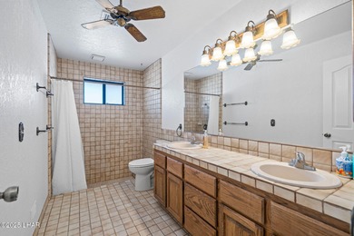 Welcome to this inviting single-family home situated along the on London Bridge Golf Course in Arizona - for sale on GolfHomes.com, golf home, golf lot