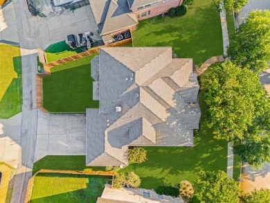 Welcome to this spacious two-story home offering 5 bedrooms, 4 on Hackberry Creek Country Club in Texas - for sale on GolfHomes.com, golf home, golf lot