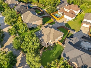 Welcome to this spacious two-story home offering 5 bedrooms, 4 on Hackberry Creek Country Club in Texas - for sale on GolfHomes.com, golf home, golf lot