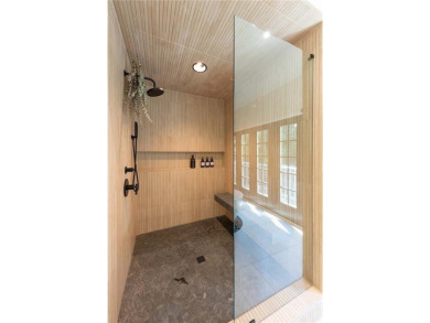Enter into a modern masterpiece in the trees of Sandy on Steel Canyon Golf Club in Georgia - for sale on GolfHomes.com, golf home, golf lot