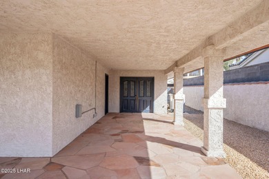 Welcome to this inviting single-family home situated along the on London Bridge Golf Course in Arizona - for sale on GolfHomes.com, golf home, golf lot