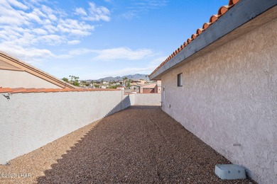 Welcome to this inviting single-family home situated along the on London Bridge Golf Course in Arizona - for sale on GolfHomes.com, golf home, golf lot