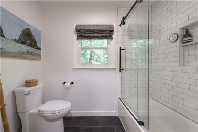 Enter into a modern masterpiece in the trees of Sandy on Steel Canyon Golf Club in Georgia - for sale on GolfHomes.com, golf home, golf lot