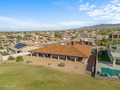 Welcome to this inviting single-family home situated along the on London Bridge Golf Course in Arizona - for sale on GolfHomes.com, golf home, golf lot