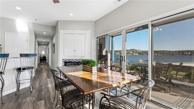 Enjoy incredible lake views from this spacious 4-bedroom, 3-bath on Tan-Tar-A Golf Club in Missouri - for sale on GolfHomes.com, golf home, golf lot