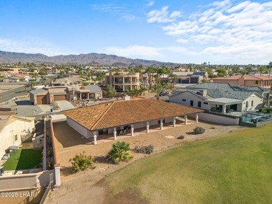 Welcome to this inviting single-family home situated along the on London Bridge Golf Course in Arizona - for sale on GolfHomes.com, golf home, golf lot