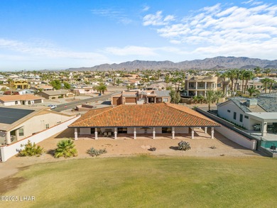 Welcome to this inviting single-family home situated along the on London Bridge Golf Course in Arizona - for sale on GolfHomes.com, golf home, golf lot