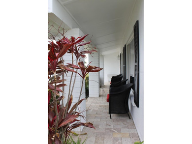 Welcome to this stunning and updated Ebbtide model home on Mainlands Golf Club in Florida - for sale on GolfHomes.com, golf home, golf lot