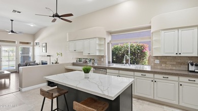 This beautiful single-story 3-bed + den, 2.5-bath home with a on The Foothills Golf Club in Arizona - for sale on GolfHomes.com, golf home, golf lot