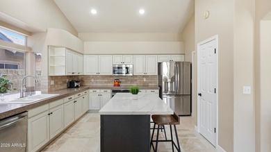 This beautiful single-story 3-bed + den, 2.5-bath home with a on The Foothills Golf Club in Arizona - for sale on GolfHomes.com, golf home, golf lot