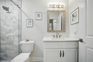 Stunning, completely remodeled end-unit first-floor coach home on West Bay Beach and Golf Club in Florida - for sale on GolfHomes.com, golf home, golf lot