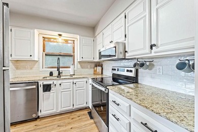 Beautifully updated Bella Vista (end unit) townhome, filled with on Bella Vista Country Club and Golf Course in Arkansas - for sale on GolfHomes.com, golf home, golf lot